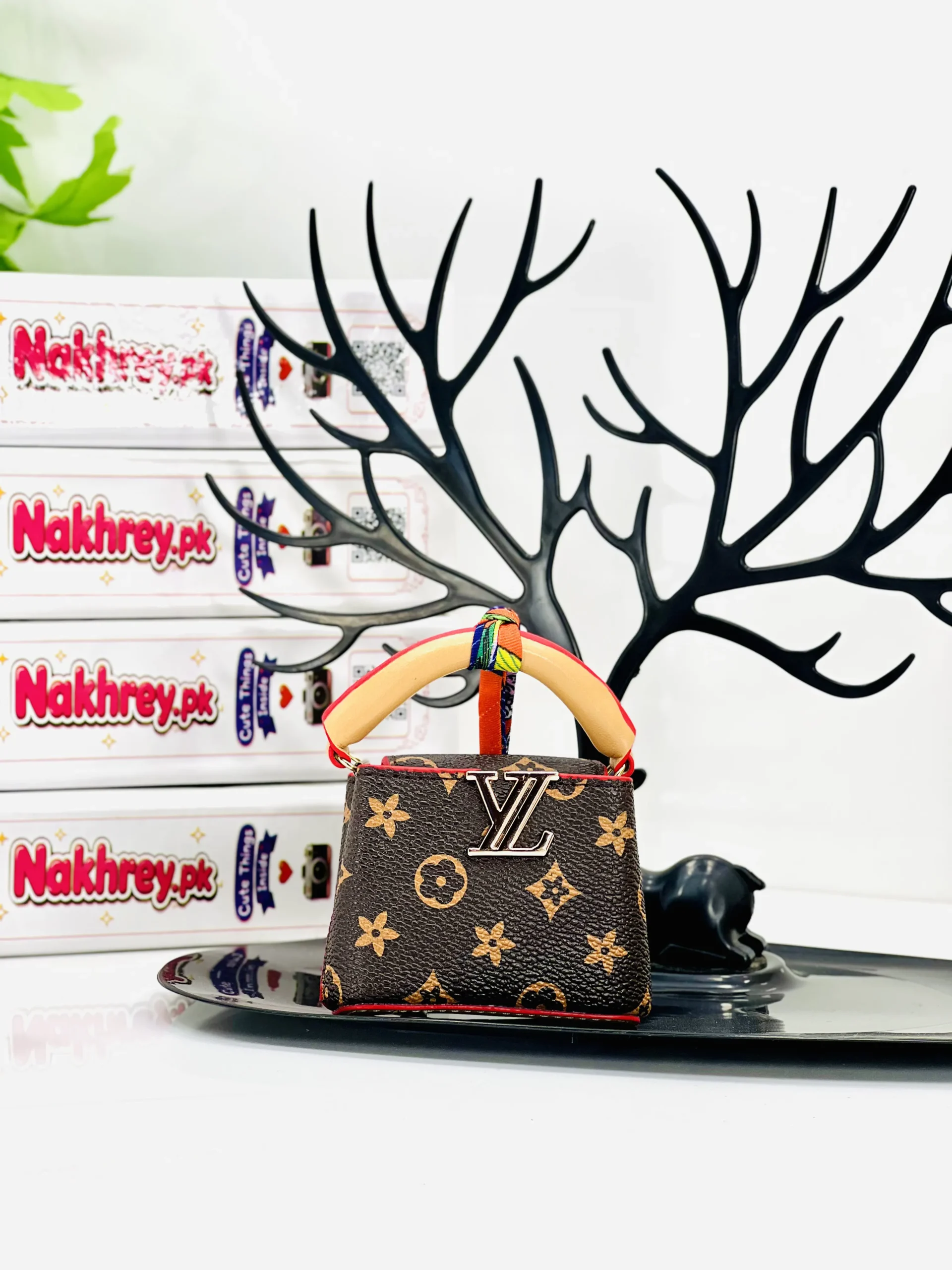 Mini LV Capucines Bag Hanging